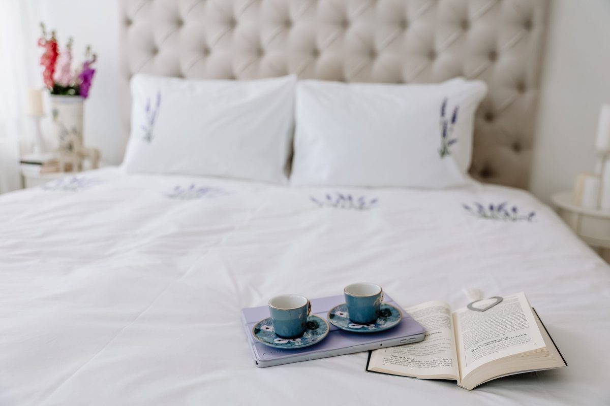 white premium cotton bedsheets with embroided flower design